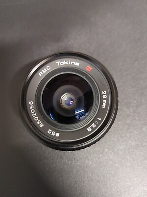 #ad RMC Tokina 28mm 1:2.8 N AI Mount Lens Works great Nikon Mount prime Lens