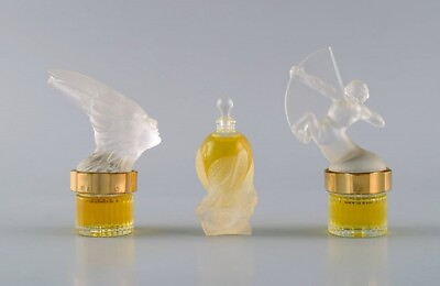 Three Lalique perfume bottles. Late 20th century.