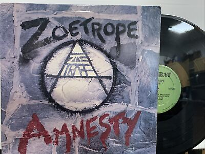 Zoetrope ‎– Amnesty LP 1985 Combat ‎– MX 8025 VG VG