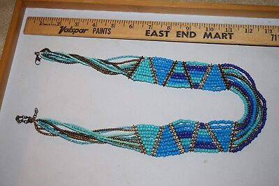 #ad Vintage to now tribal looking plastic beaded necklace