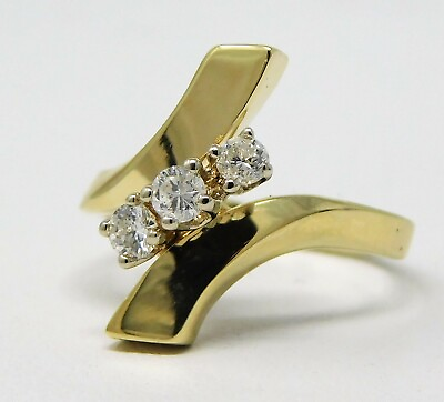 #ad 14 kt Yellow Gold 3 Stone Diamond Bypass Style Ring Size 4.5 B2277