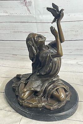 Handcrafted Native American Woman Bronze Sculpture with Bird by Milo Signed Sale