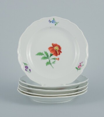 #ad Meissen Germany. Five plates of porcelain decorated with flowers.