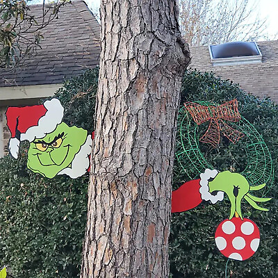 christmas decoration peeping sculpture grinch thief hand cut house outdoor