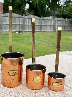 Vintage Hanging Copper Long Handle measuring set include  2 1 and 1 2 cup