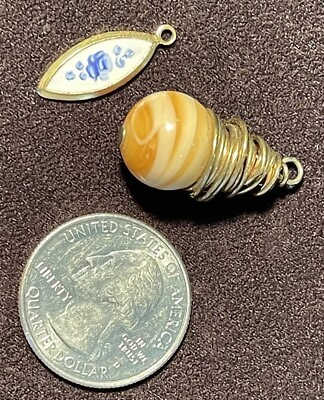 #ad 2 small gold Colored pendant