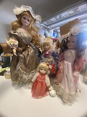 #ad Collection of 4 antique dolls in perfect condition.