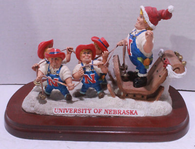 #ad University Mascot Holiday Sleigh: University of Nebraska Herbie Huskers Figure