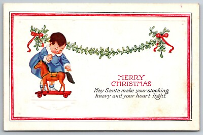 #ad #ad Merry Christmas May Santa Child with Horse on Wheels Embossed Unused Postcard