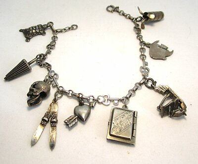#ad Sterling Silver Charm Bracelet w 9 Charms 17.6 grams 6 3 4”