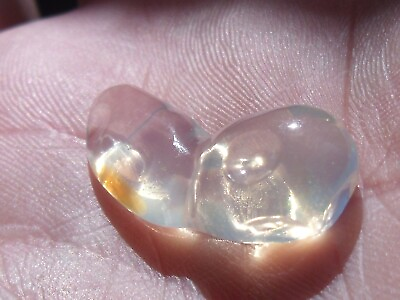 #ad 12.00 Carats. Contra luz carved Fire Mexican Opal