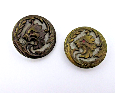 #ad Two Antique Buttons Lion or Dragon Mask Ornate Metal Shank Backs 1 1 2quot; diameter