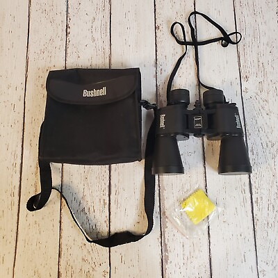 Bushnell 10x50 Insta Focus Binoculars. Bag and caps included.